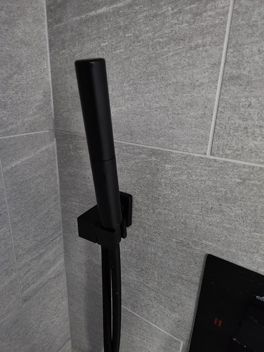 Separate shower wand.