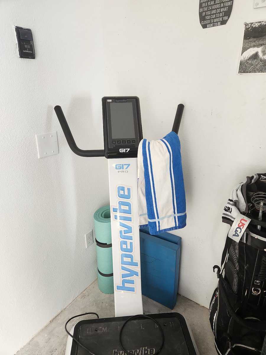 A Hypervibe machine and free weights to use.
