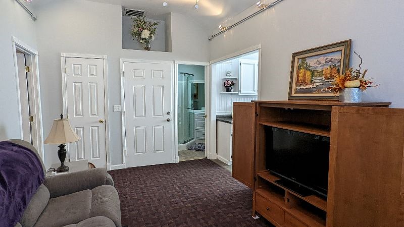 Living Room towards bathroom and kitchen