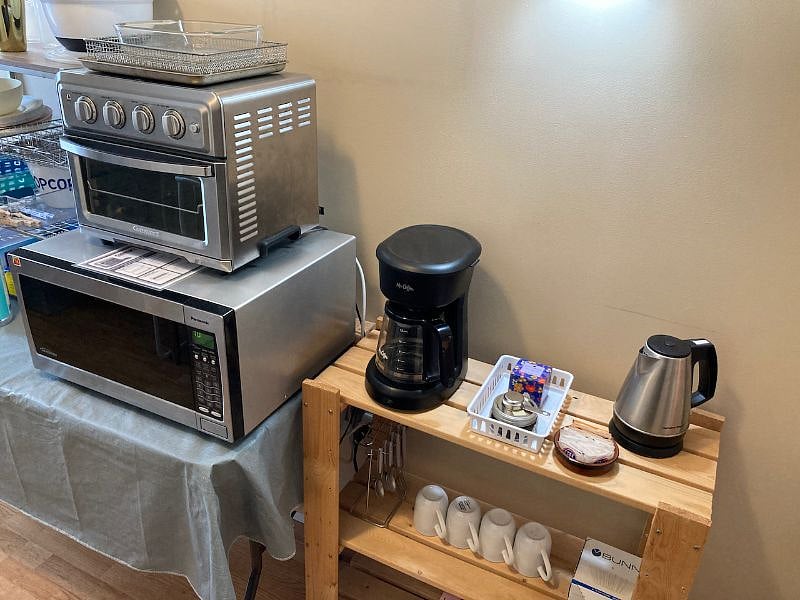 Mini convection oven with air fryer, microwave, coffee and tea bar