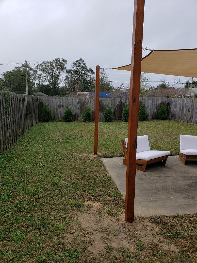 Fenced back yard.
