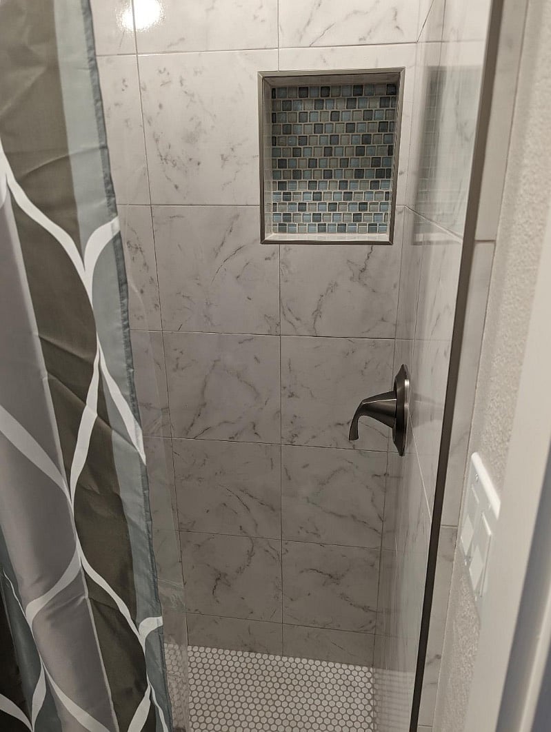 upstairs shower brand new tile!