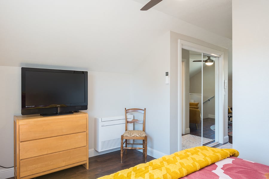 Floor-mounted mini-split air conditioner/heater. Smart TV, and spacious dresser. See mirrored closet door directly across from your private bathroom.