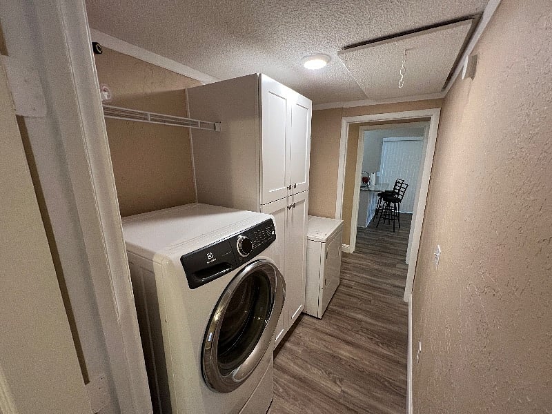 Laundry room in house with washer and dryer
