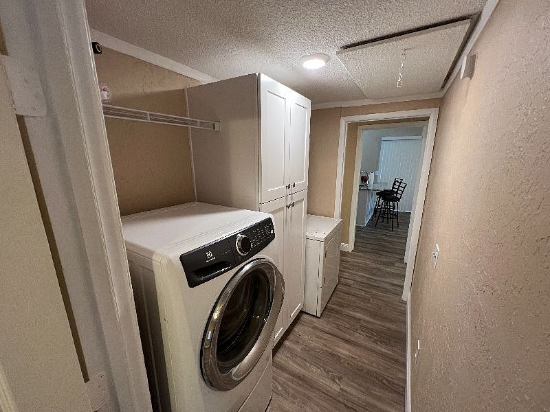 indoor laundry room with washer and dryer