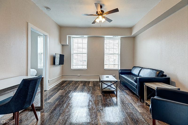 Living room, including desk in corner