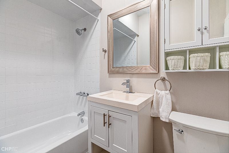 Bathroom with bathtub and shower