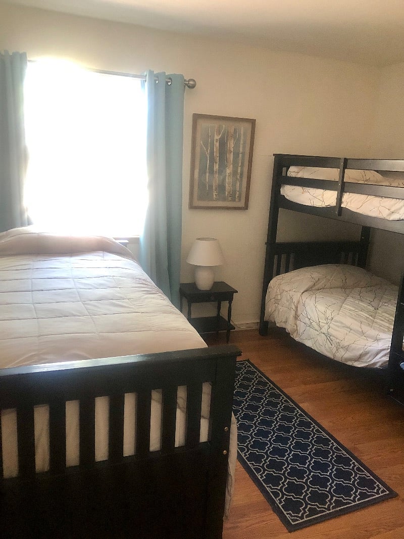 Bunk room sleeps three with 4th optional trundle pull out.