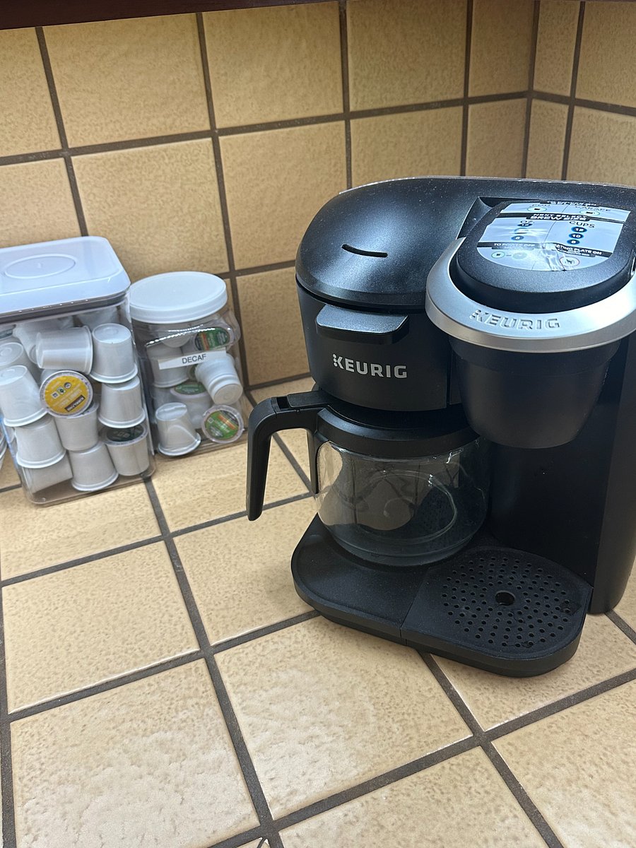 Coffee station with started supply of coffee and tea