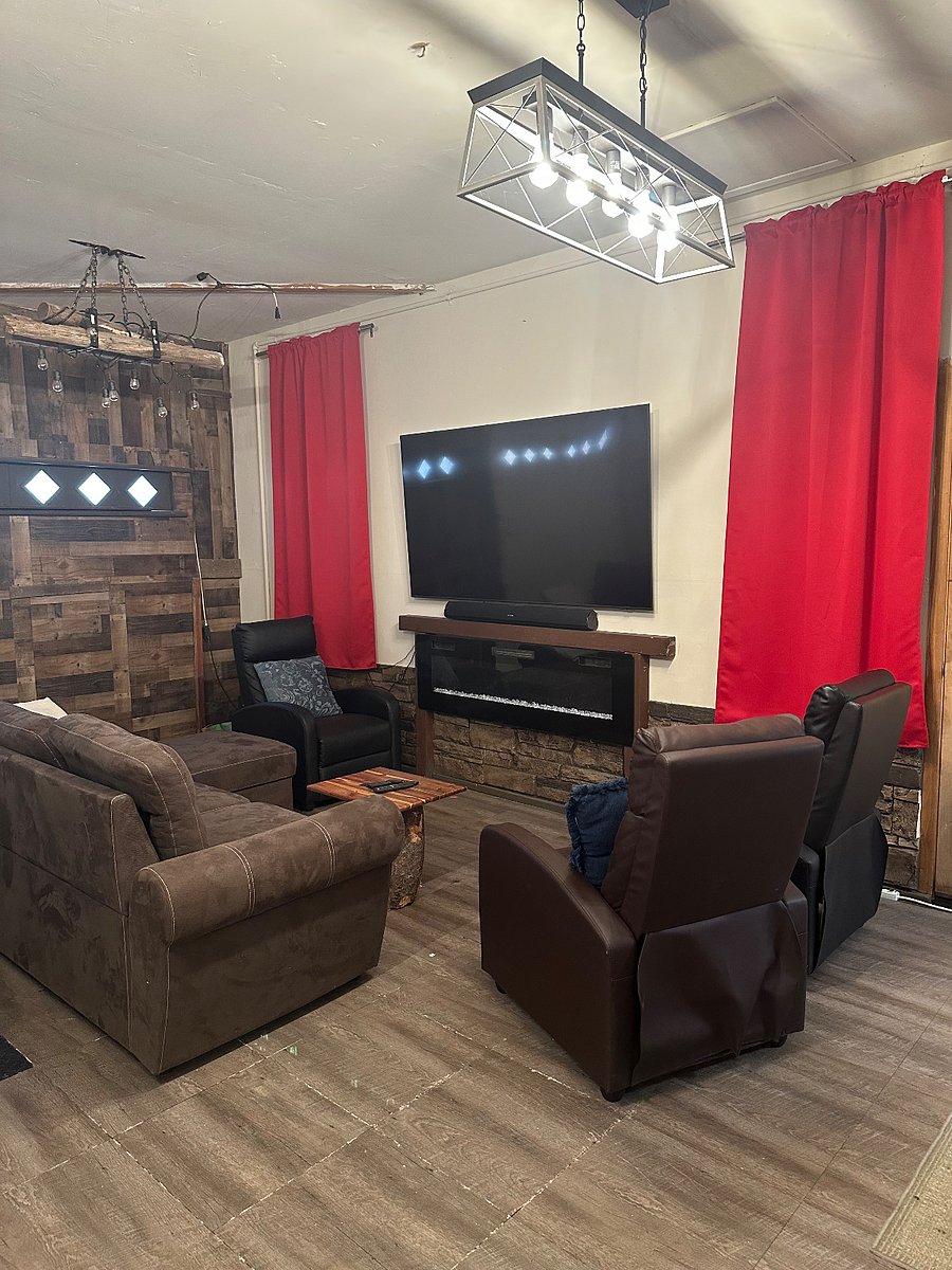 Enjoy tv or movies in the converted garage rec room