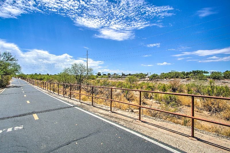 The Chuck Huckelberry Loop Trail (60 miles long paved trial) / Walking distance. This trail is great for walking, biking or walk your way towards St. Phillips Plaza Restaurants and Shoppes.  [5 min walk]. (Access through condominium complex gate)