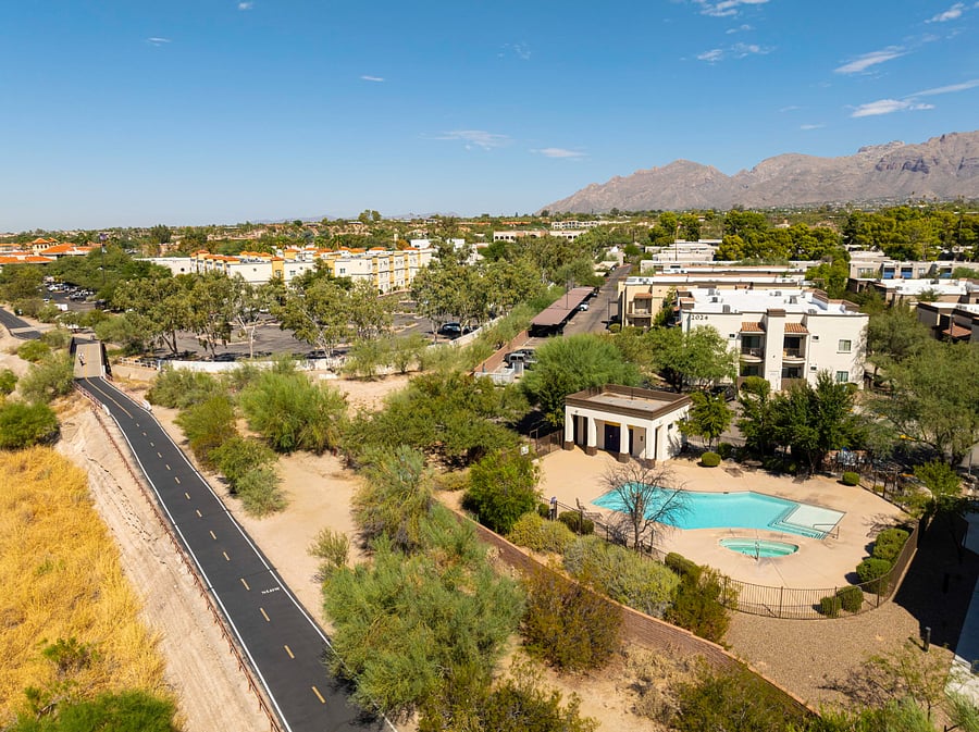 The Chuck Huckelberry Loop Trail (60 miles long paved trial) / Walking distance. This trail is great for walking, biking or walk your way towards St. Phillips Plaza Restaurants and Shoppes.  [5 min walk]. (Access through condominium complex gate)