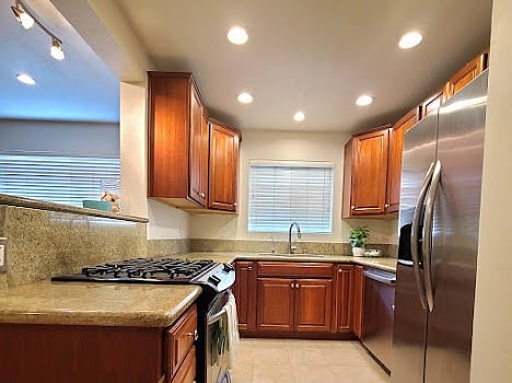 Full kitchen with brand new dishwasher and microwave