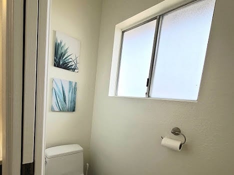 Toilet room in main bedroom suite