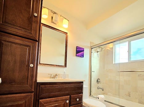 Second floor bathroom with full size tub and shower and plenty of storage space.