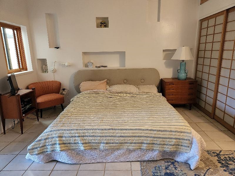 Downstairs bedroom with King size bed.