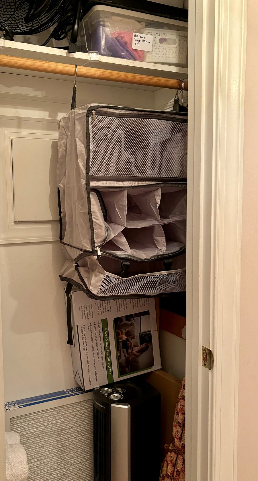 Extra closet with clothes bar, extra towels, fan, heater, hot wax treatment and foot soaker.