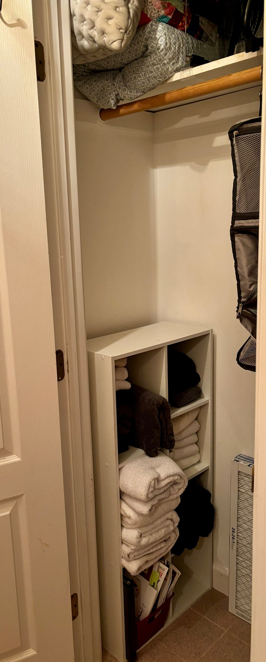 Extra closet with clothes bar, extra towels, fan, heater, hot wax treatment and foot soaker.