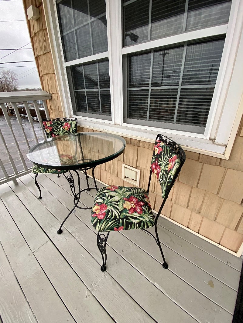 End unit so no one will walk by on the porch while you enjoy a drink looking at the ocean.