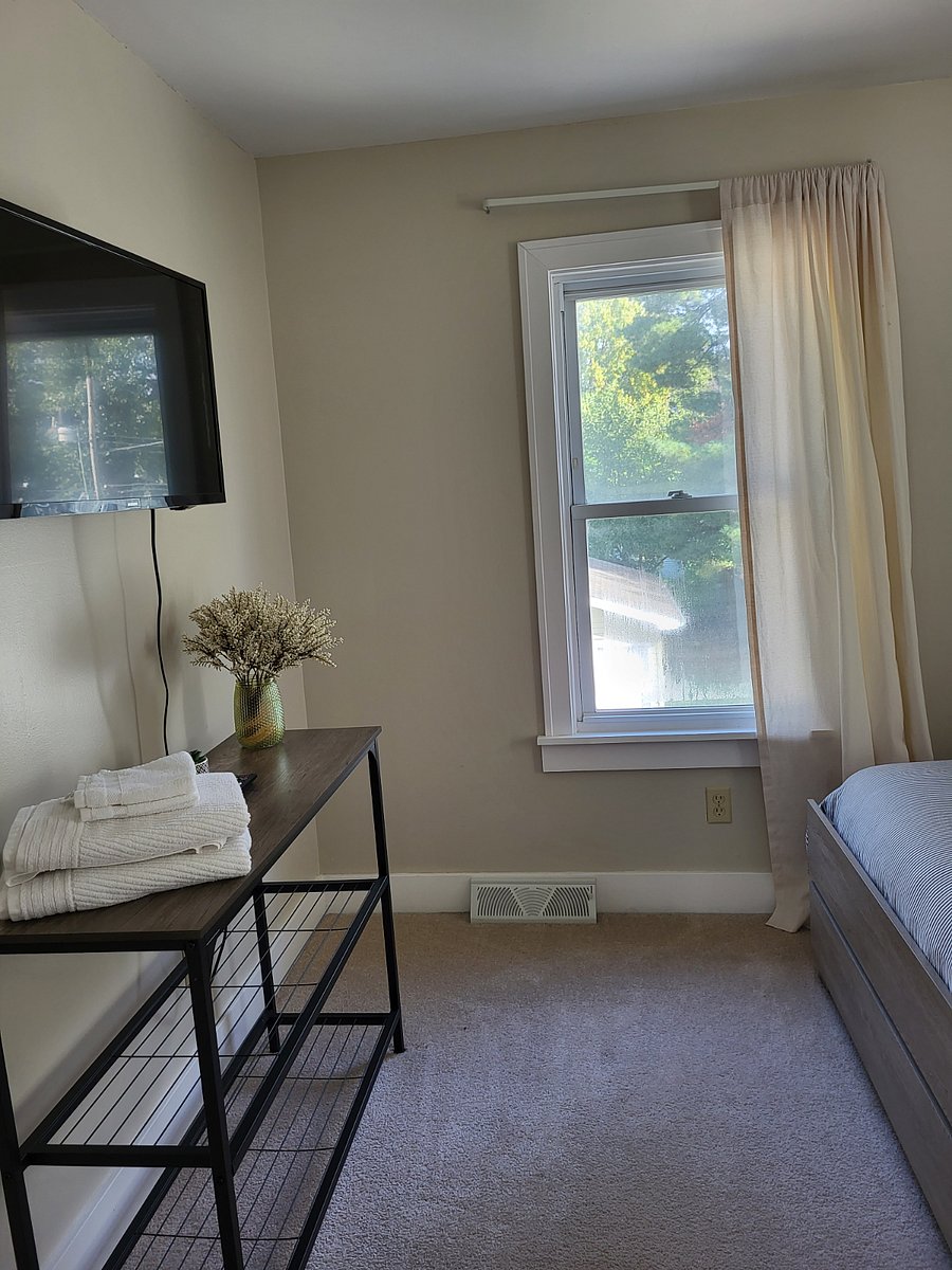 Bedroom 2 on second floor, with tv.