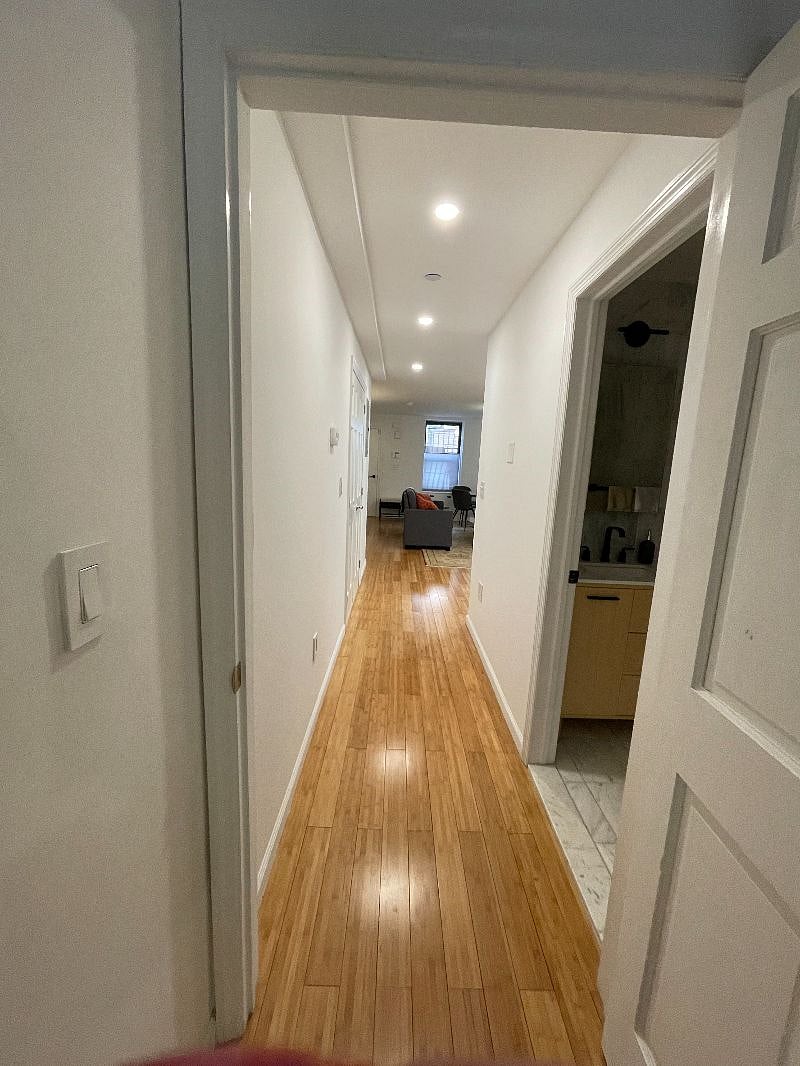 Hallway for separate private bedroom and bathroom