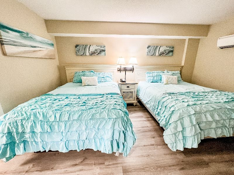 Bedroom with 2 queen beds