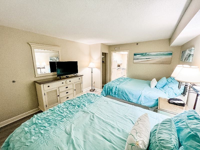 Bedroom leads to the kitchen, bathroom and living room