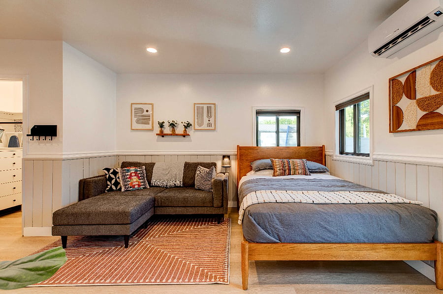 Queen Size Bed with Down Comforter and Linen Duvet, and Crisp Linens.