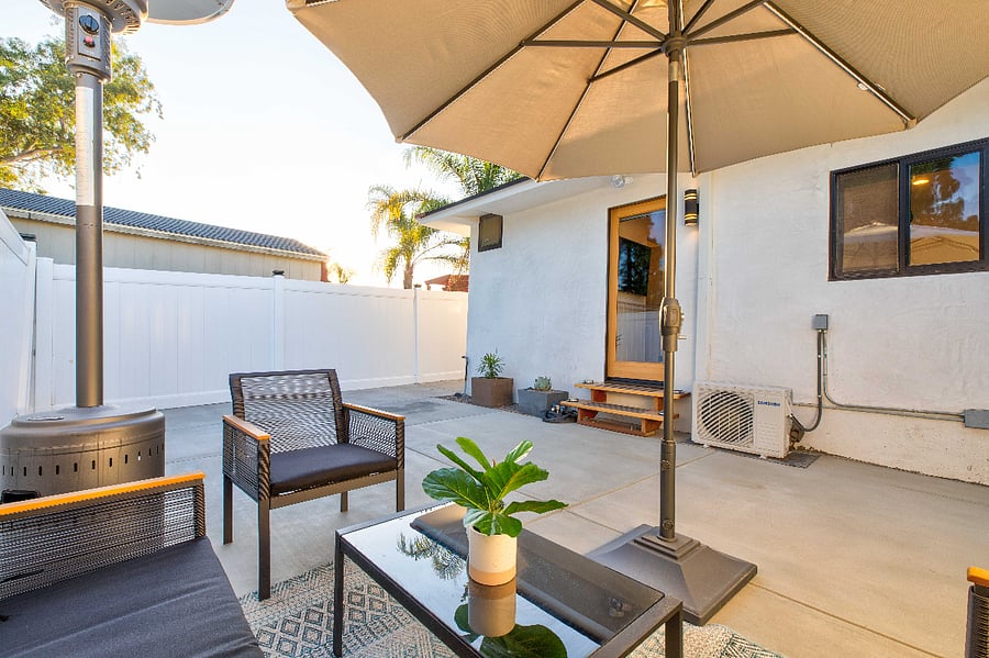 Personal Seating Area with Adjustable Umbrella.