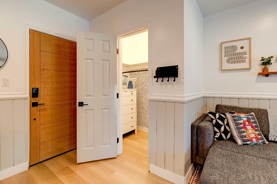 Large closet with Storage, Drawers/Dresser, Iron, Vacuum, Cleaning Supplies.
