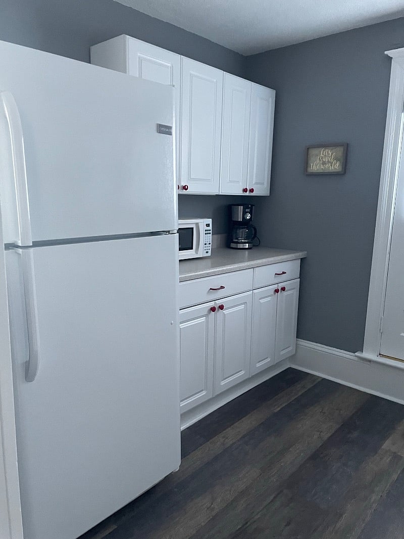 Kitchen offers a full size refrigerator. 