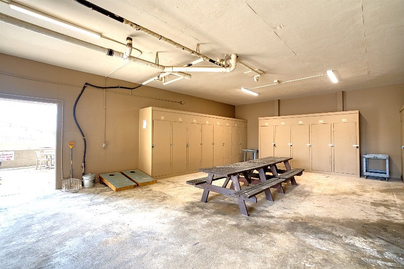 Storage locker with beach chair and beach wagon