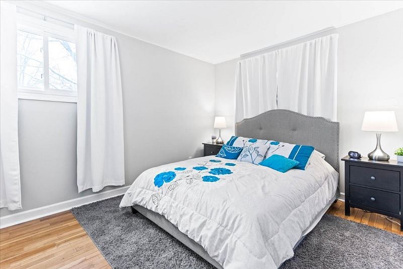 Bedroom 2 with Queen bed and blackout curtains