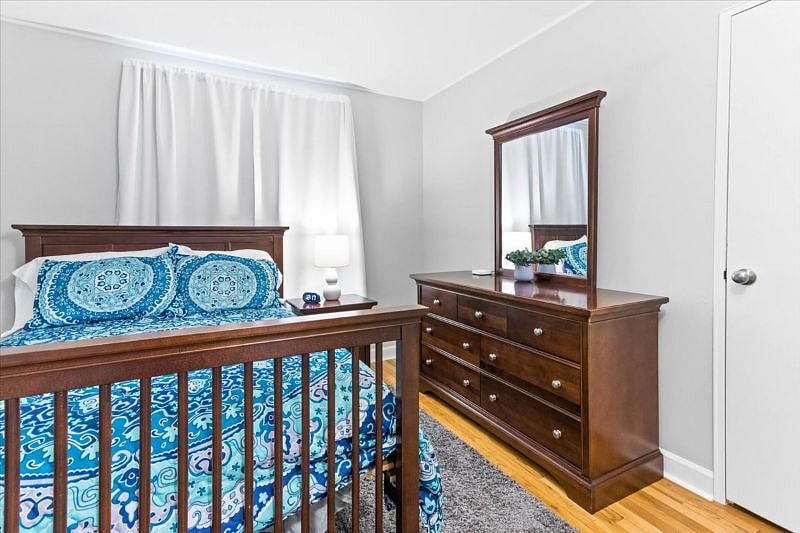 Bedroom 3 with Full bed and blackout curtains.