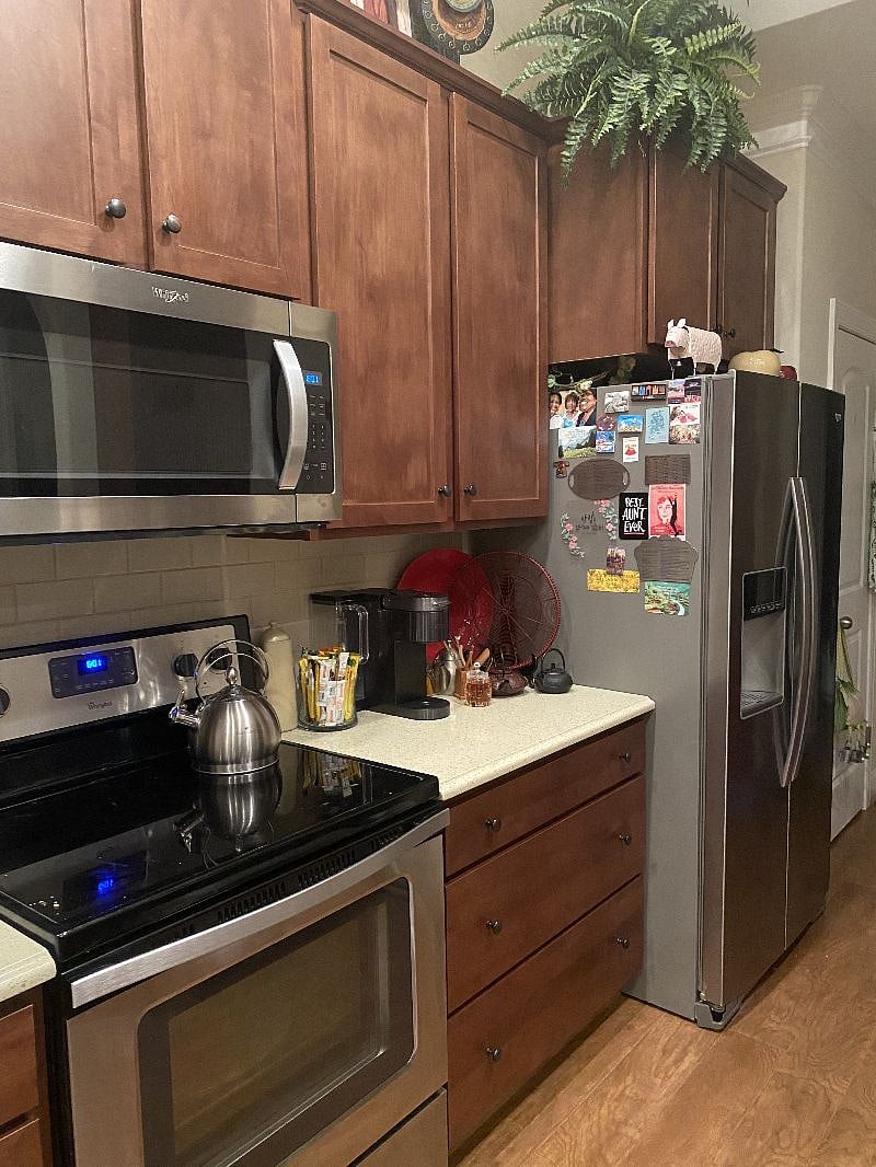 Kitchen: fully stocked and a microwave, smooth-top stove, refrigerator, dishwasher, and Keurig