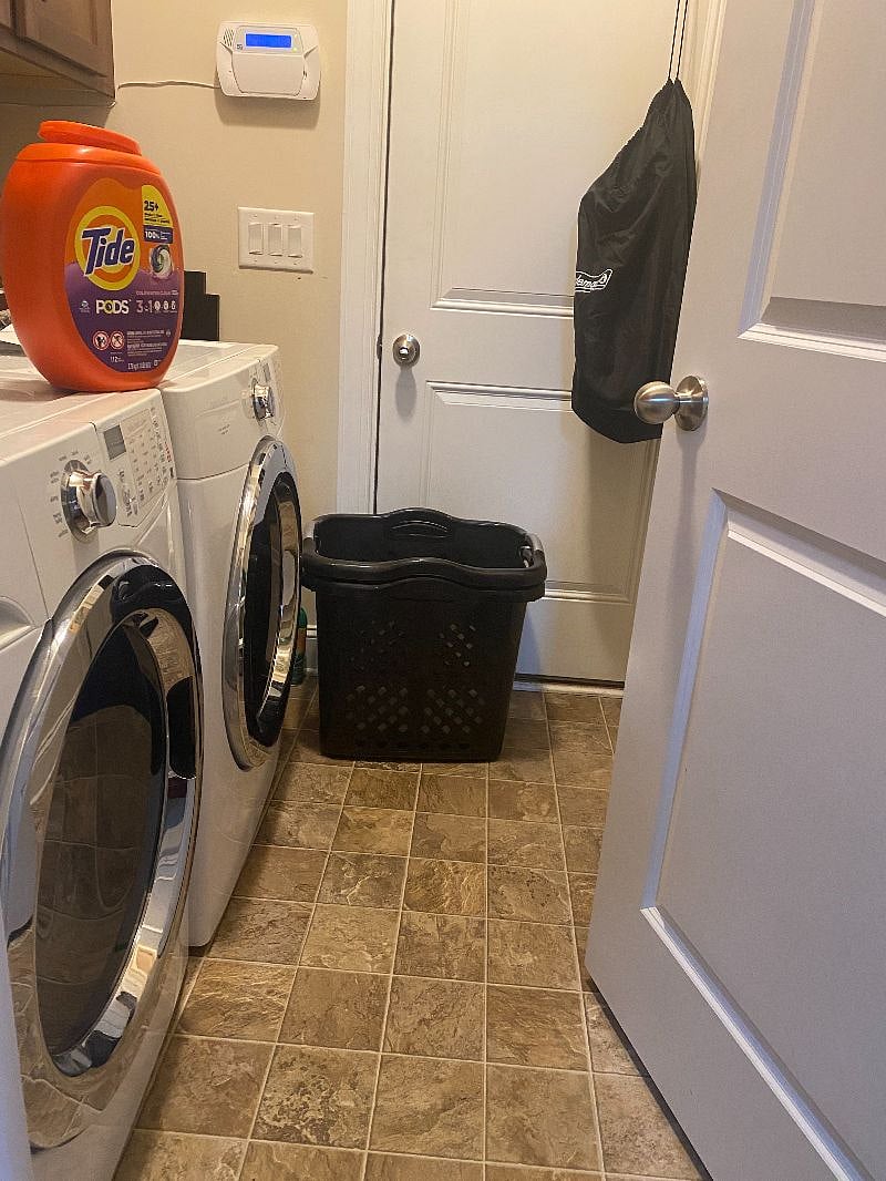 Laundry with full-size front-loading dryer and HE washer
Hamper and laundry baskets available