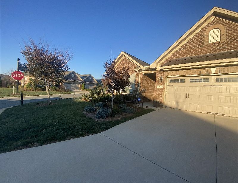 Front of house (corner lot). This is an HOA community called Friedberg Villages. It is Parking is available in the driveway. Please park your vehicle to the right of the dividing line, so I have room exit the garage if I need to.