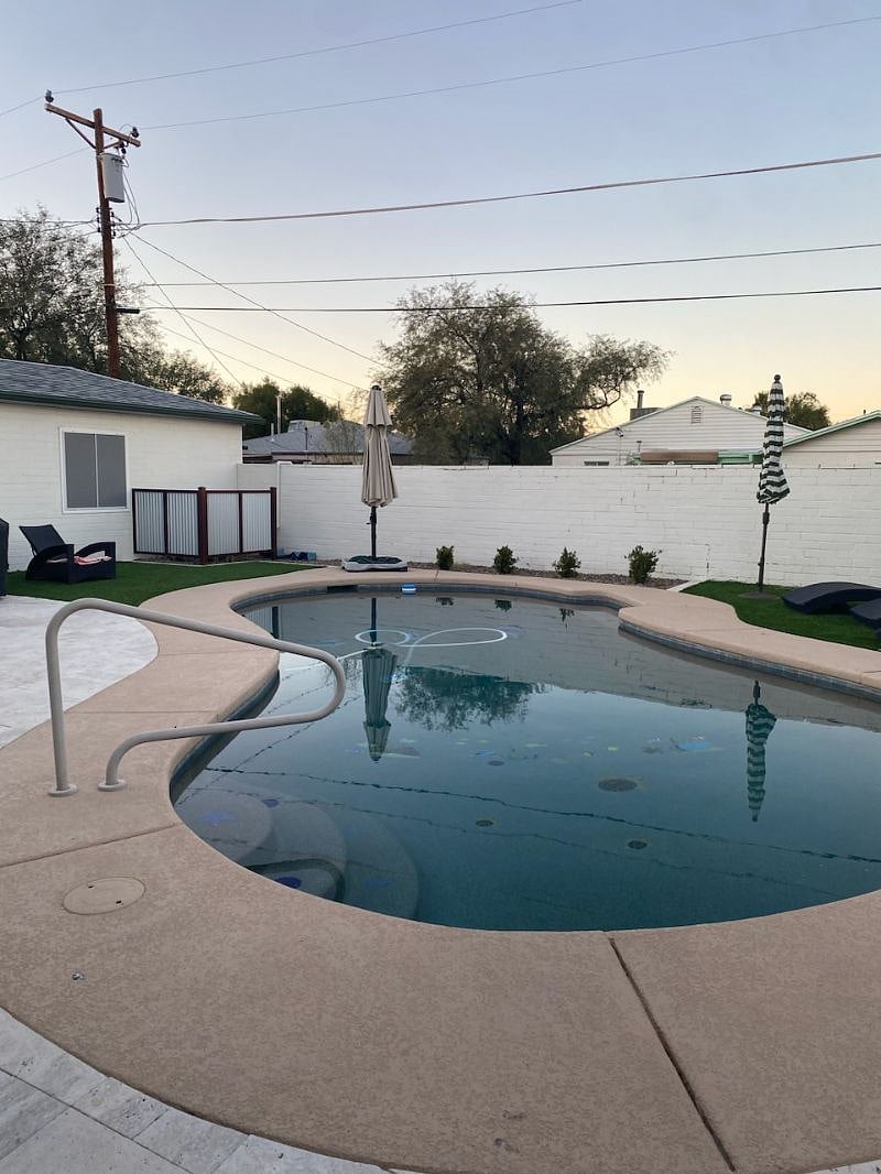 Pool with turf and deck