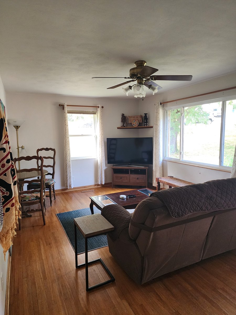 Living room with smart TV and fold out table