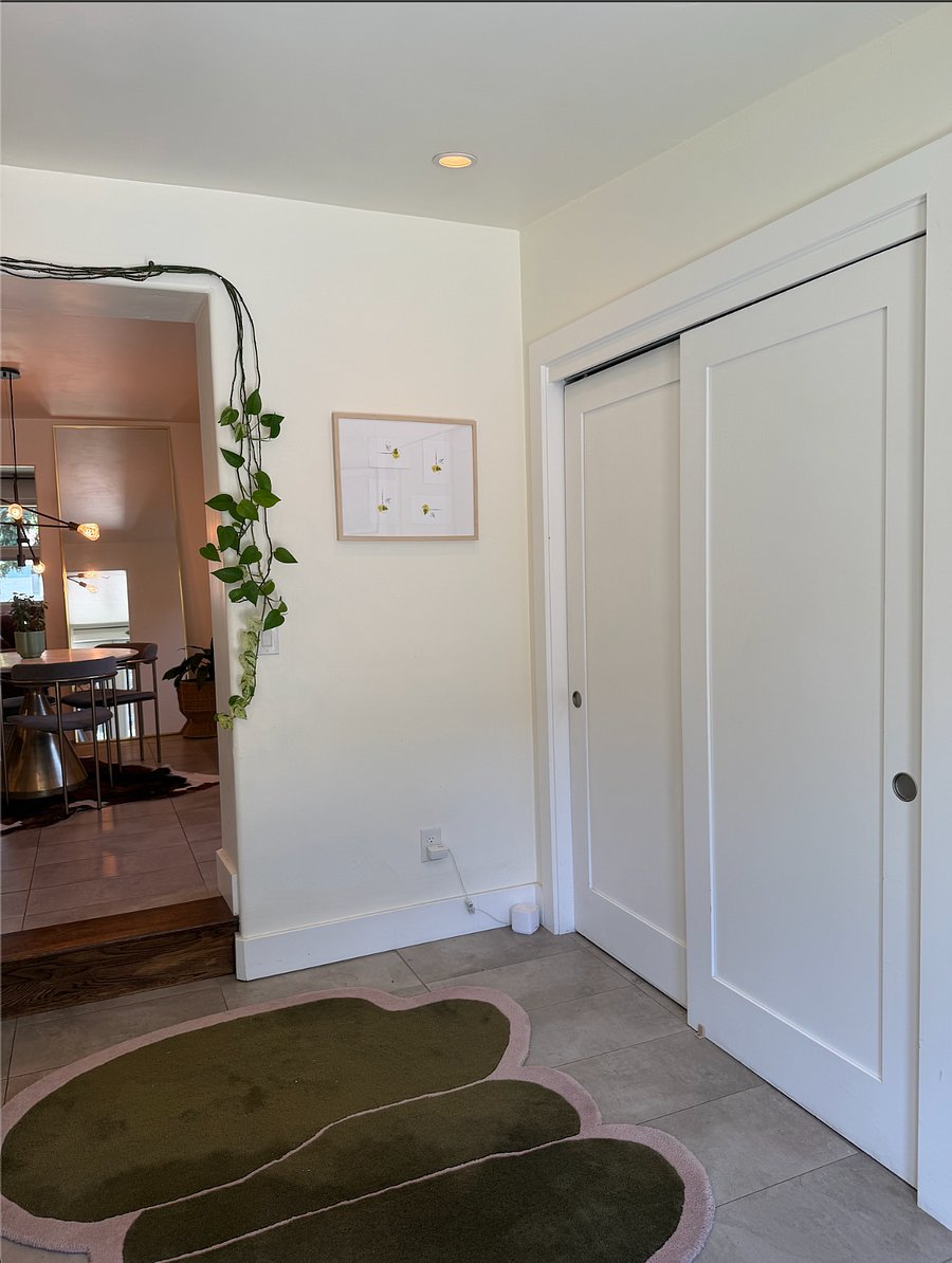 View from mudroom into kitchen - doors in front are a pantry 