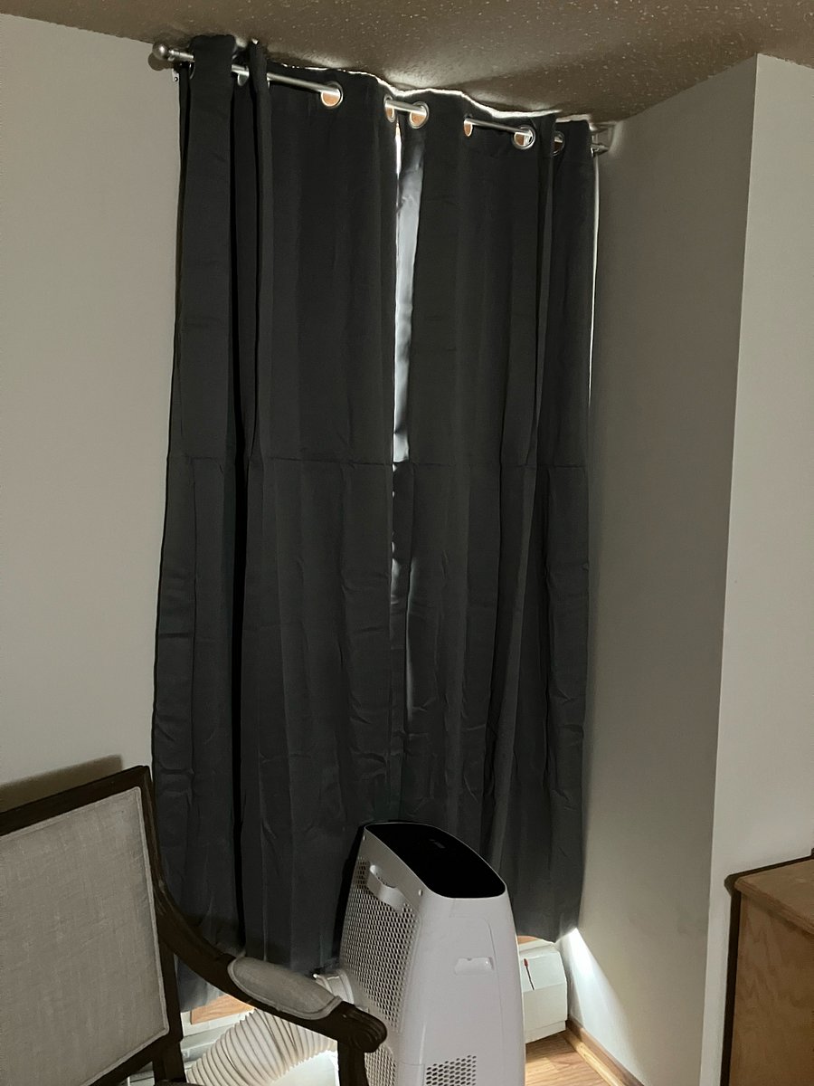 Second bedroom with blinds and room darkening curtains
