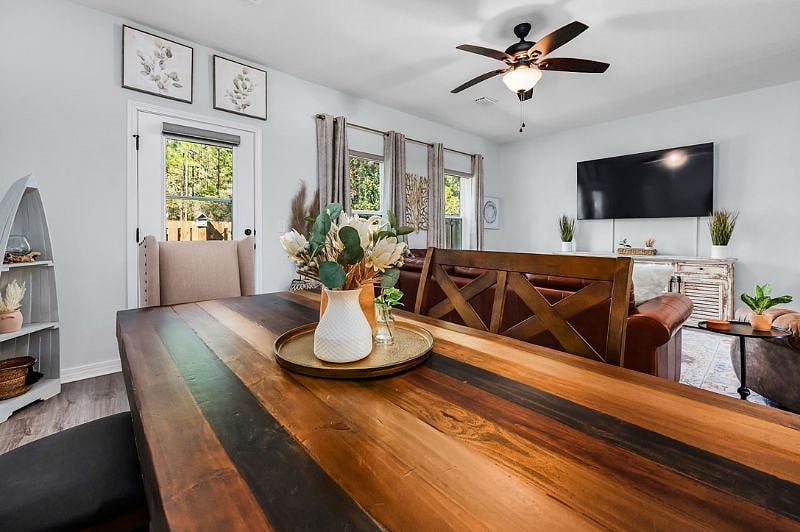 Dining Table next to Living Room looking out towards Patio