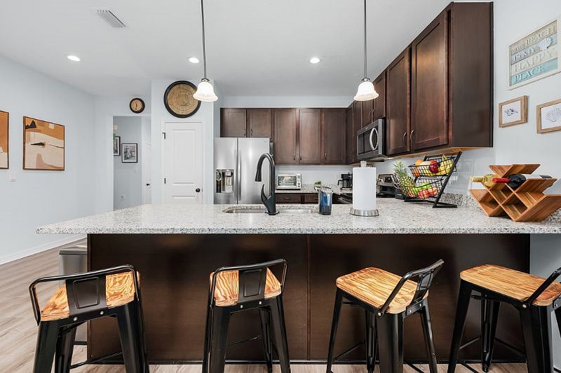 View of Kitchen with barstools