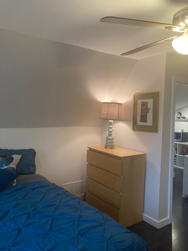 bed and dresser from opposite angle