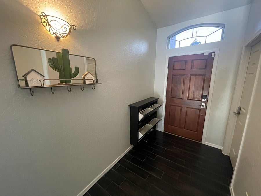 shoe rack fits 4 shoes to keep them out of the bedroom