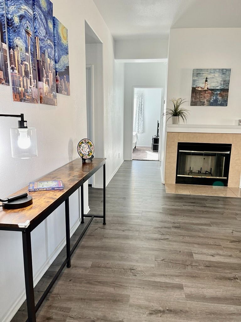 Wood burning fireplace. Waterproof laminate  is through out the home except the bedrooms. 
