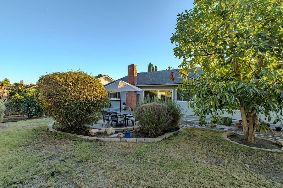 Enjoy this gorgeous green backyard when home.