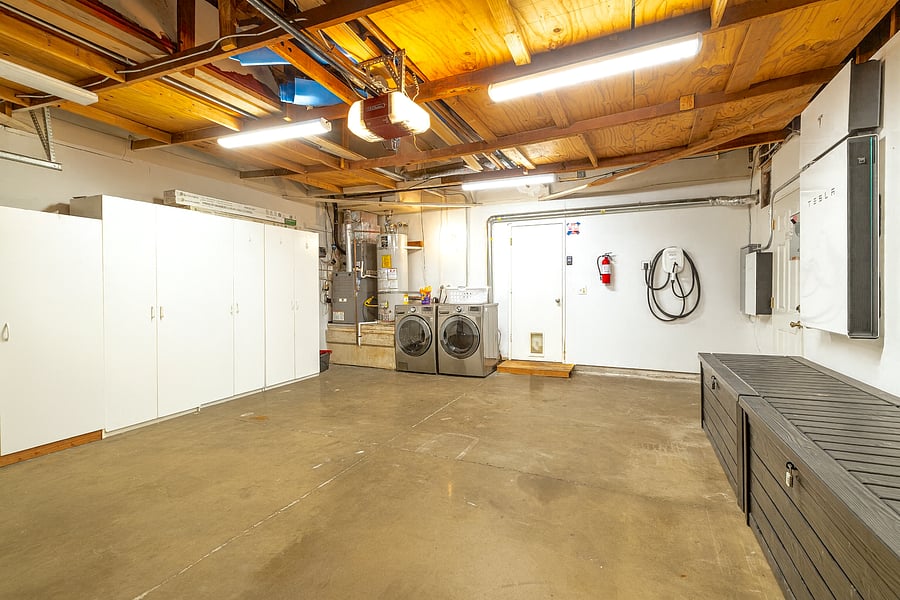 Park, charge, store, or do laundry in this attached 2-car garage designed for maximum flexibility and convenience!