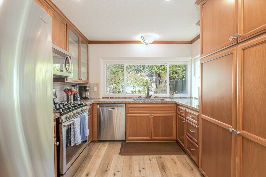 Gourmet Kitchen with top of the line appliances and cooking utensils