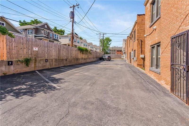 area for assigned parking space behind building